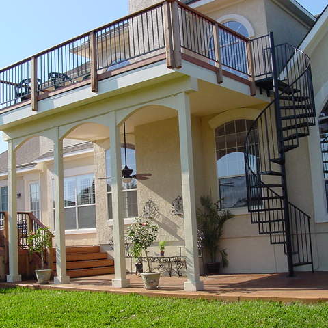 A large house with stairs leading to the second floor.